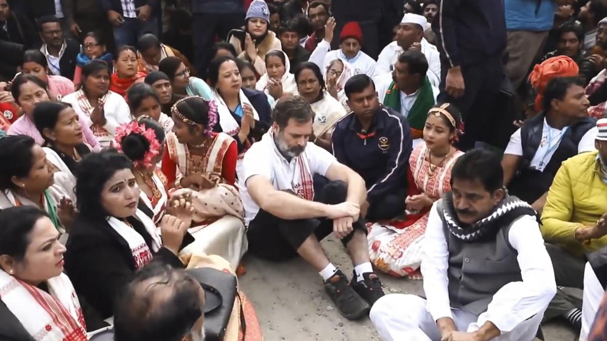 Supporters in Assam sing "Raghupati Raghav" by the barriers as Rahul Gandhi's yatra is prevented from reaching Batadrava Than.